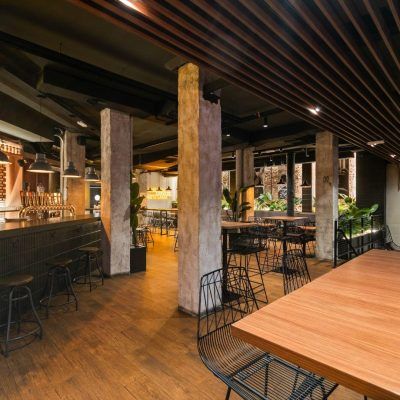 Spacious event venue with a cozy ambiance, ideal for networking events, product launches, and team-building.
